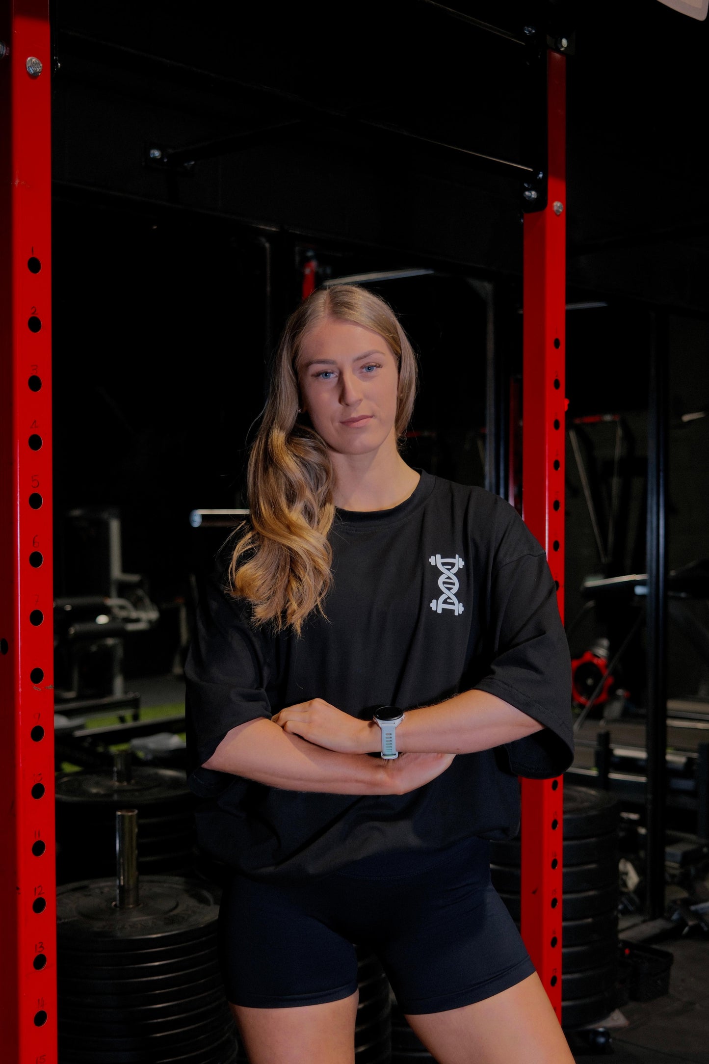 Female wearing anatomise black oversize t-shirt from front